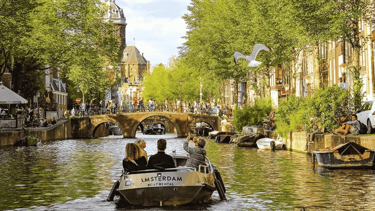 Why Water Is the Best Way to See Amsterdam - Especially During Kings Day Week