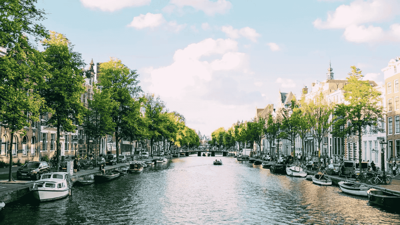 Why Water Is the Best Way to See Amsterdam - Especially During Kings Day Week